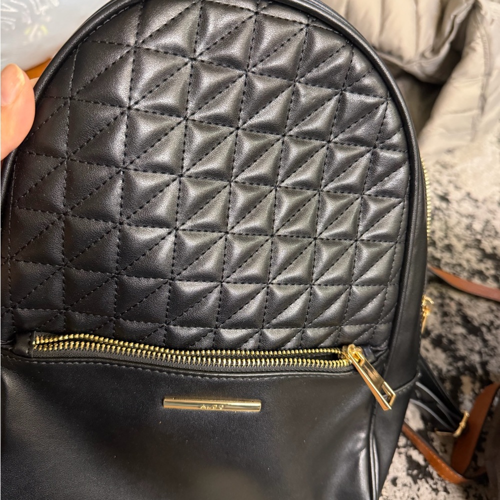 ALDO Quilted Black Backpack with Gold Accents